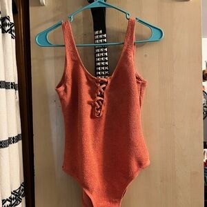 L- Vigoss Orange Bodysuit One Piece with Lace-Up Detail